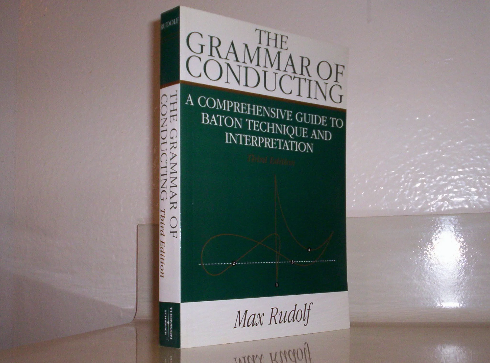 The Grammar of Conducting: A Comprehensive Guide to Baton Technique and Interpretation