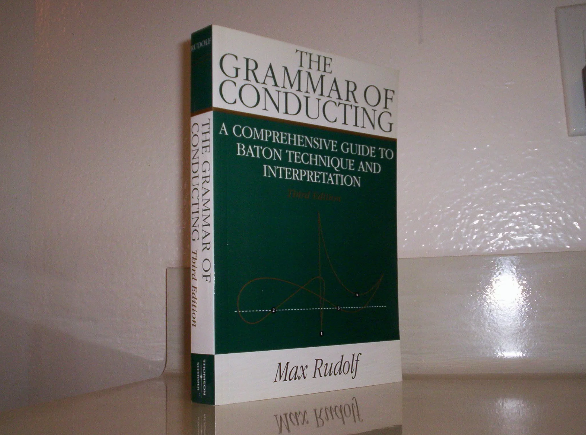 The Grammar of Conducting: A Comprehensive Guide to Baton Technique and Interpretation